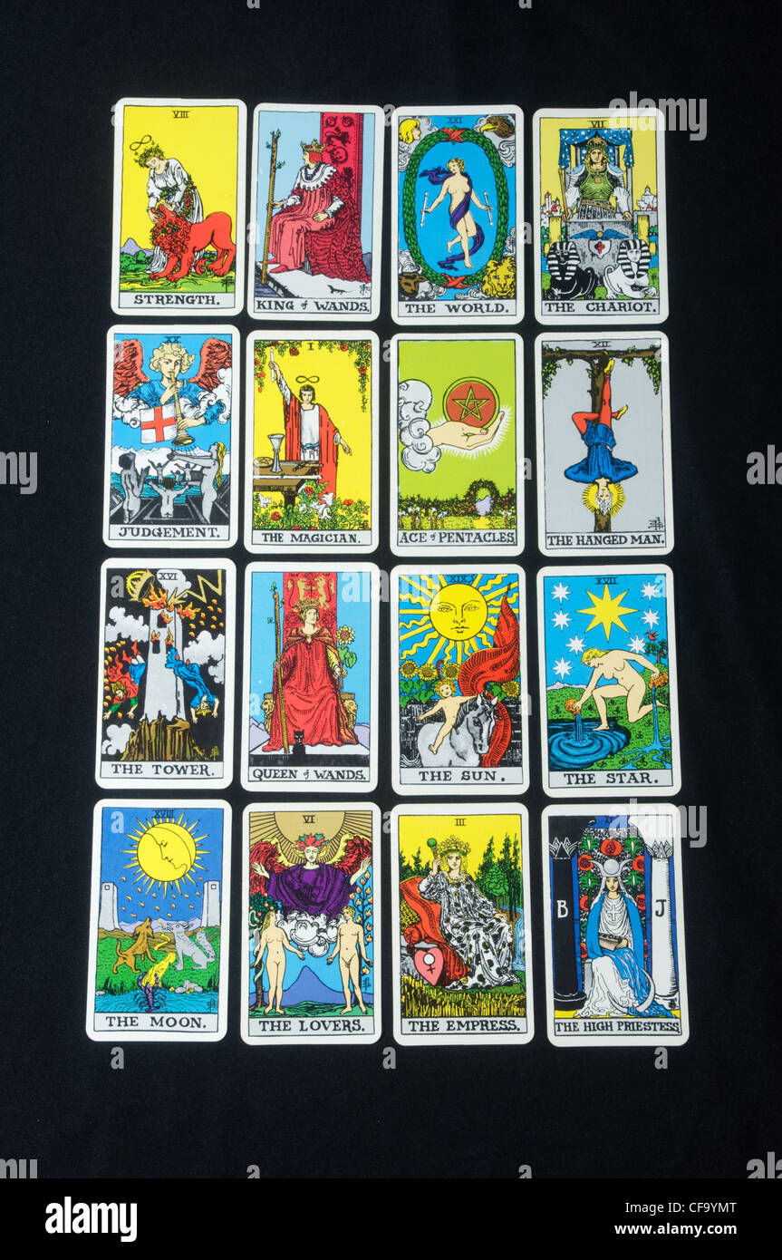 Tarot cards layed out in a rectangular tarot spread with four rows and four columns Stock Photo