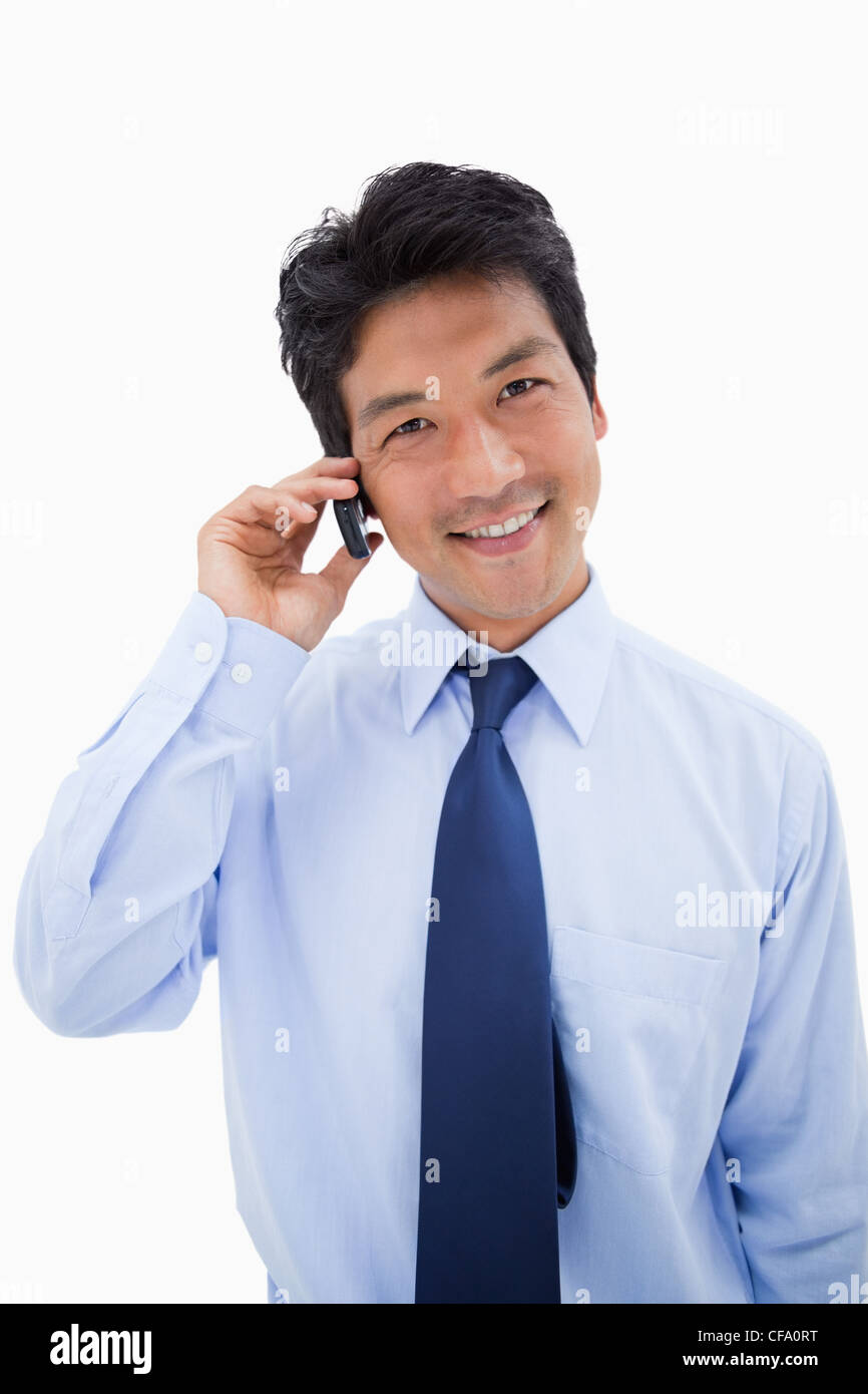 Portrait of a smiling businessman making a phone call Stock Photo