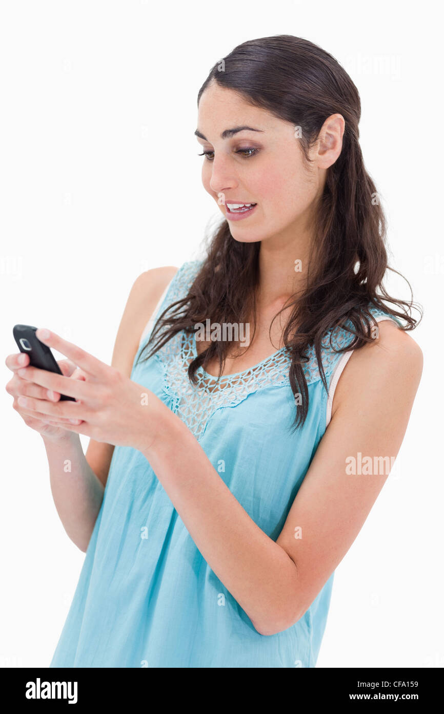 Portrait of a woman reading a text message Stock Photo