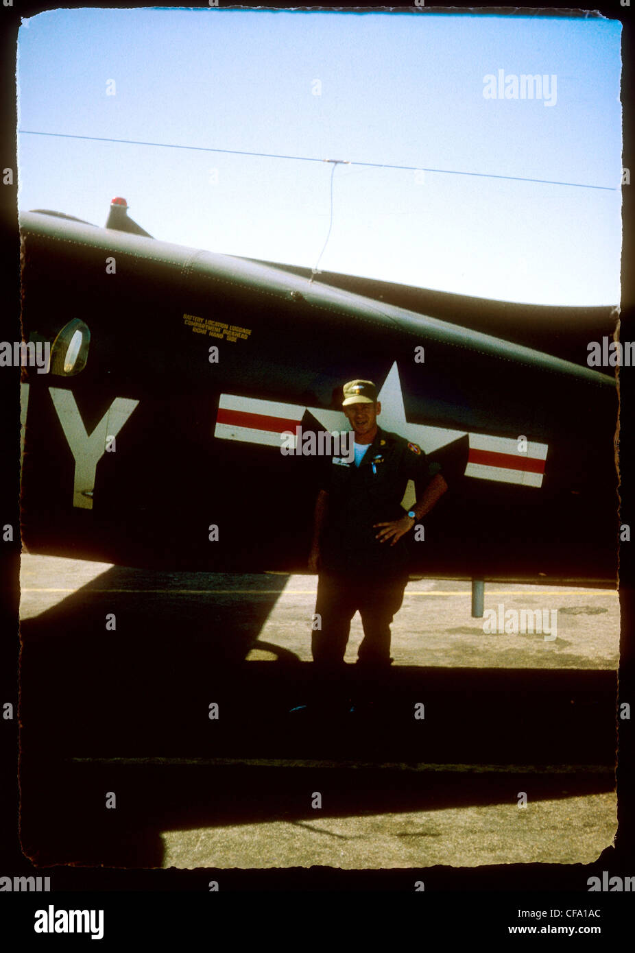 US army pilot posing next to airplane during Vietnam War Stock Photo