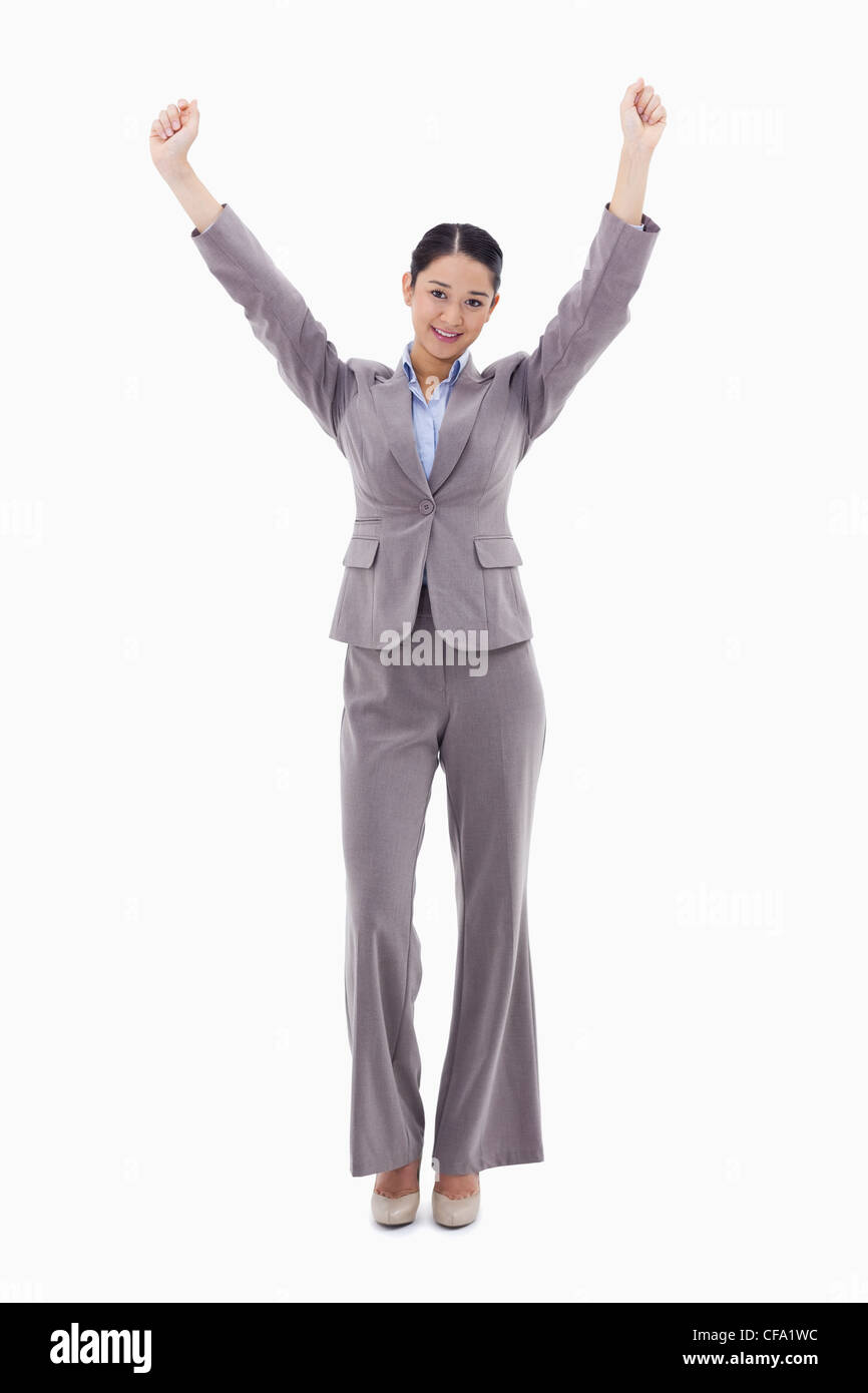 Portrait of a happy businesswoman posing with the arms up Stock Photo