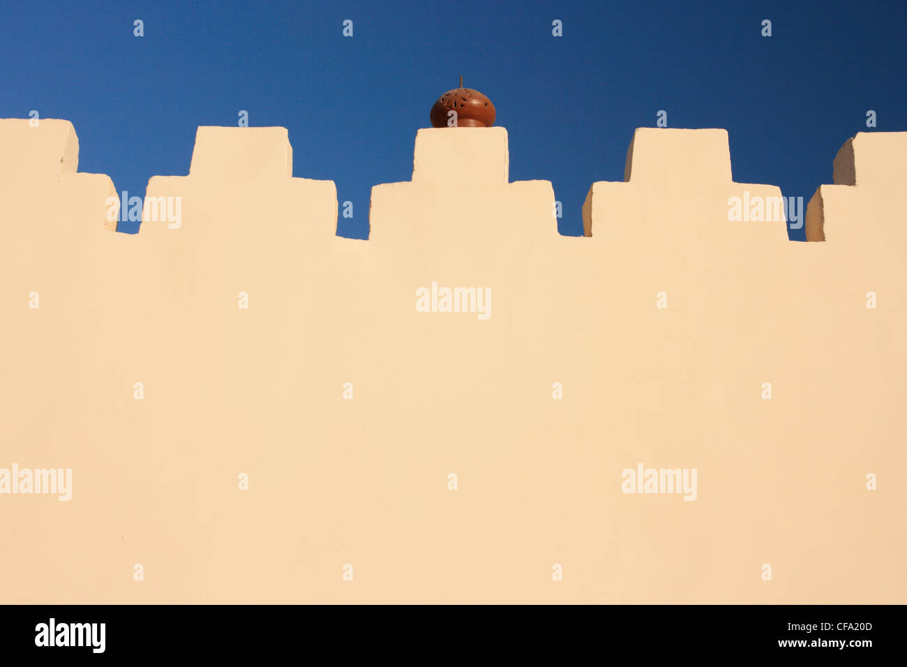 Wall of arabian house with battlement Stock Photo