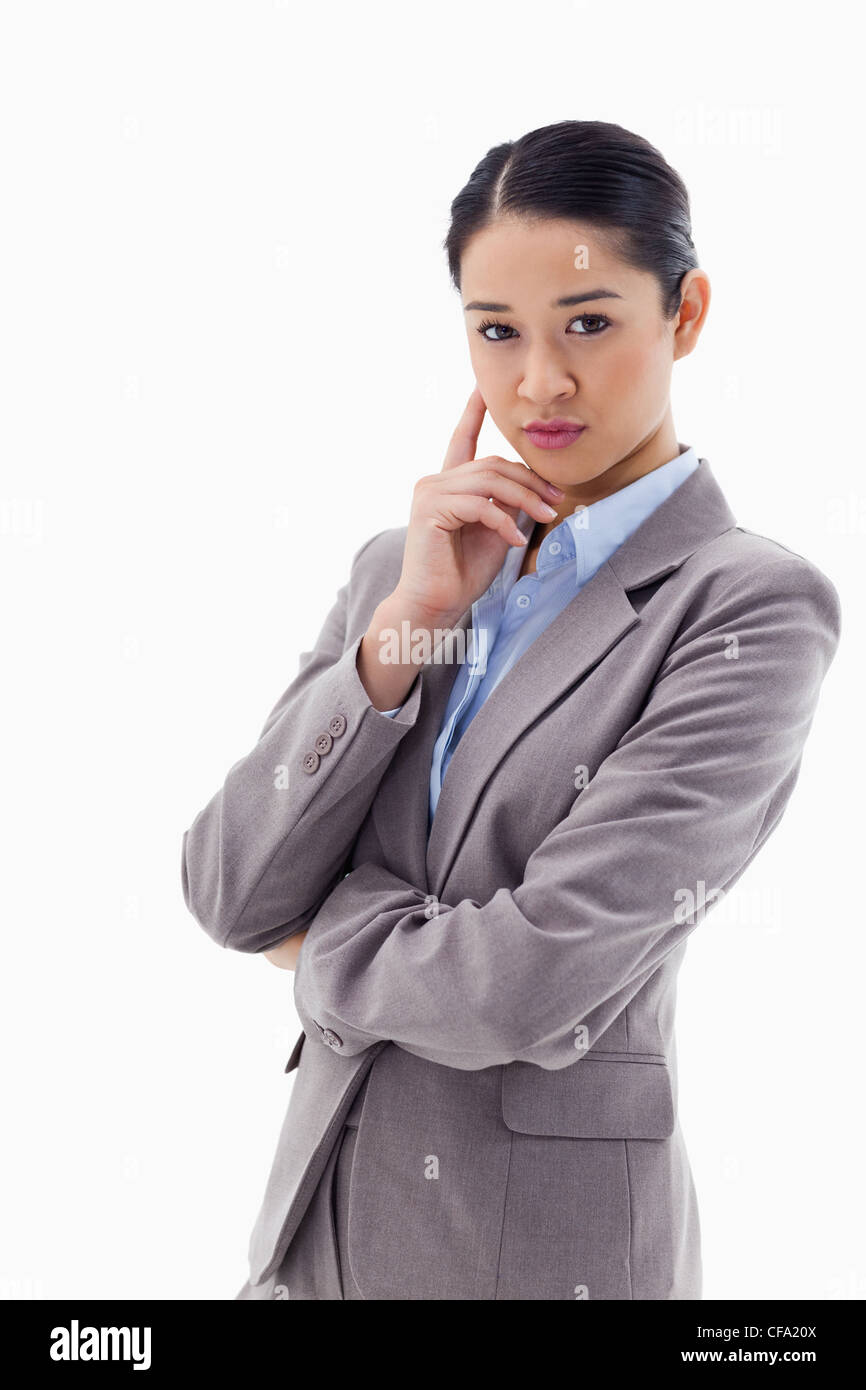 Portrait of a young businesswoman thinking Stock Photo
