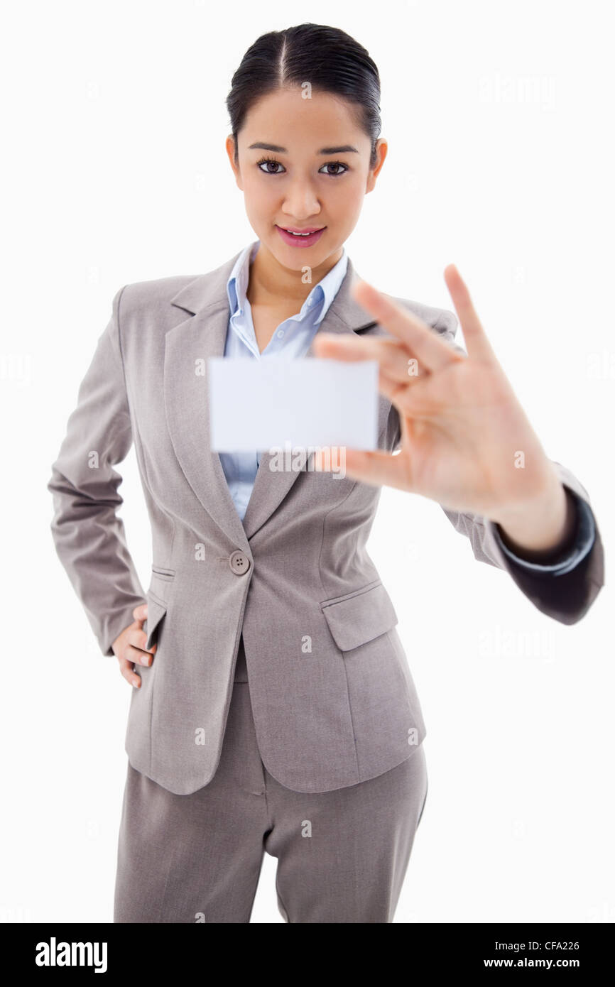 Portrait of a gorgeous businesswoman showing a blank business card Stock Photo