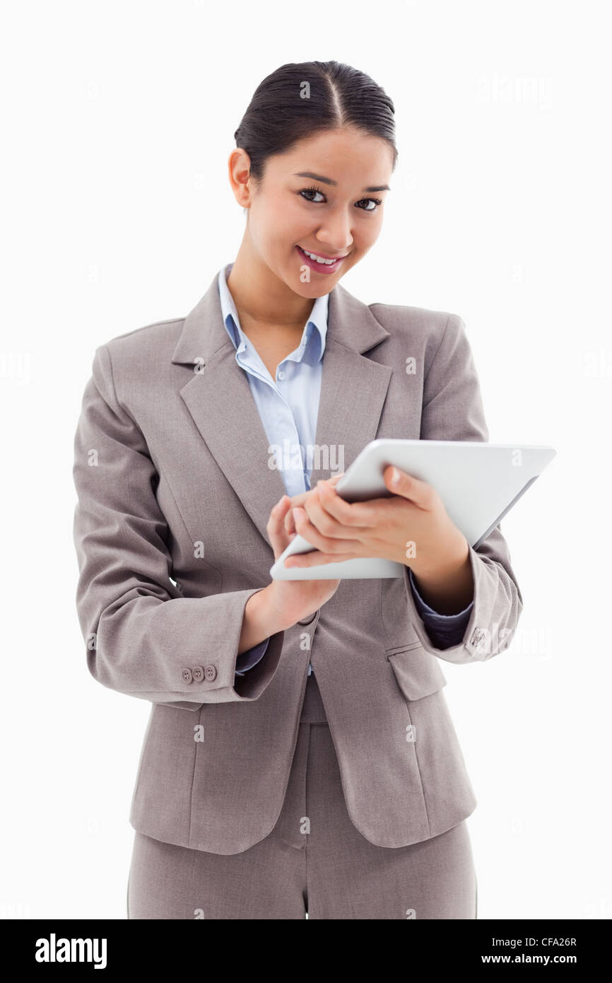 Portrait of a smiling businesswoman using a tablet computer Stock Photo