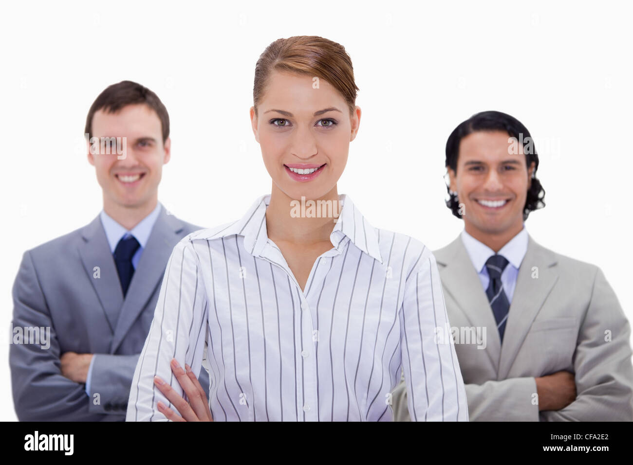 Smiling Business team with arms folded Stock Photo