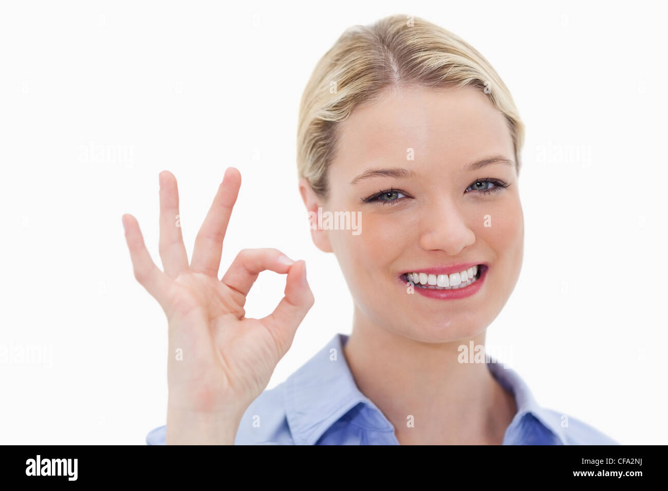 Smiling woman approves Stock Photo