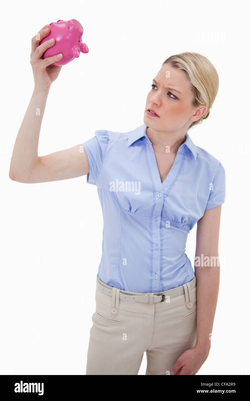 Sad woman with empty piggy bank Stock Photo - Alamy