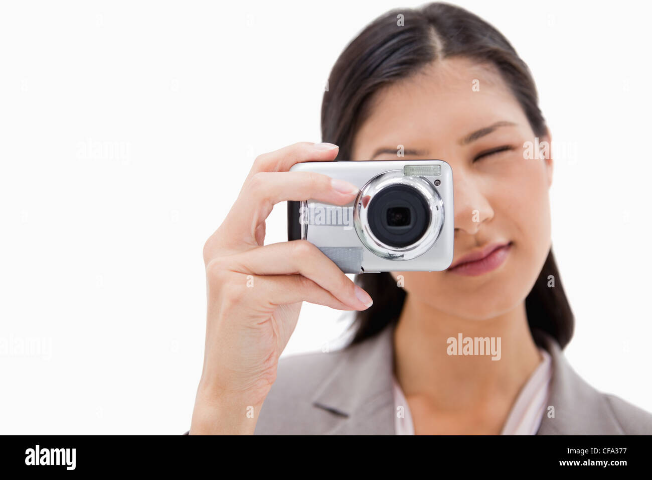 Businesswoman using camera Stock Photo