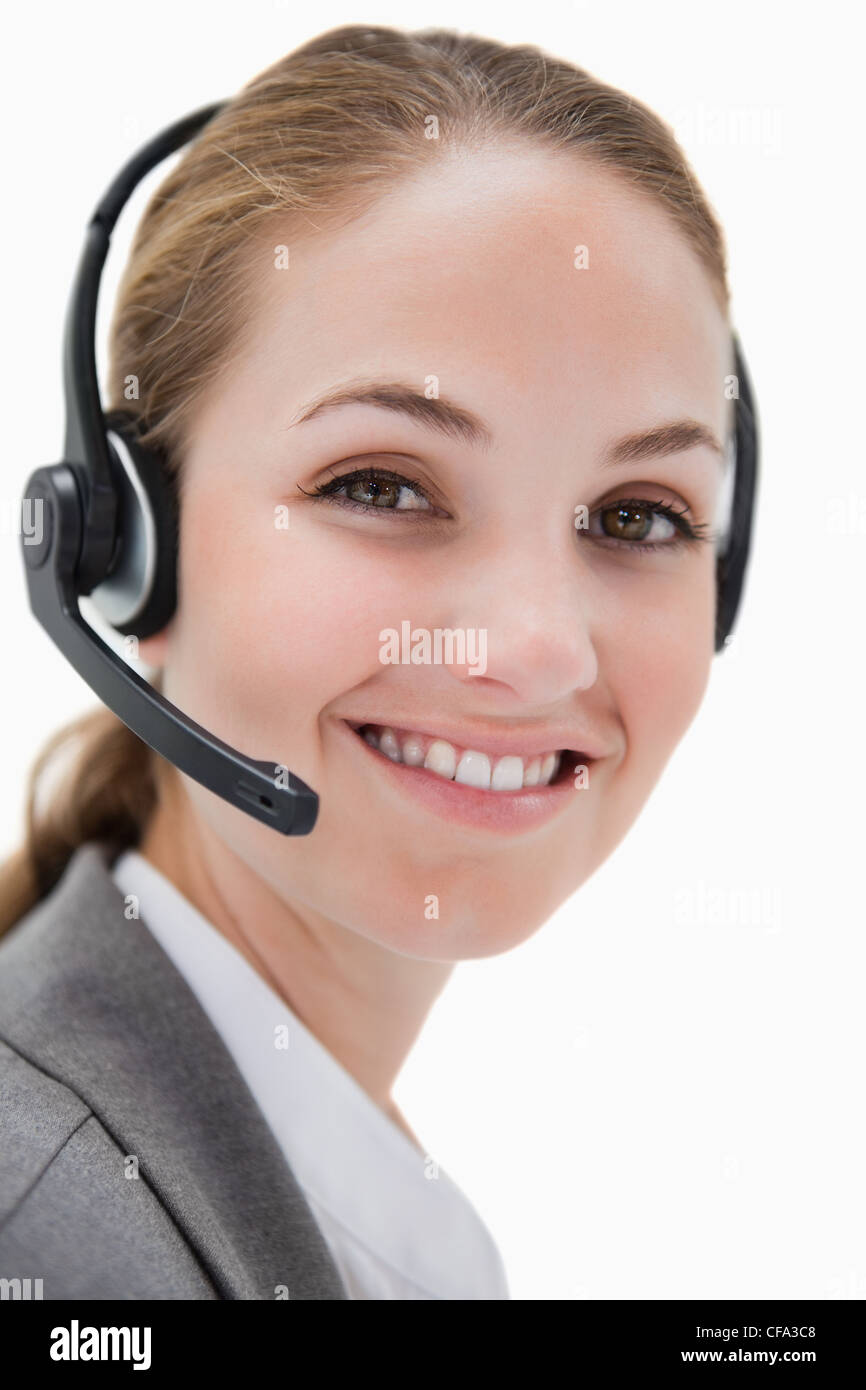 Smiling female call center agent working Stock Photo
