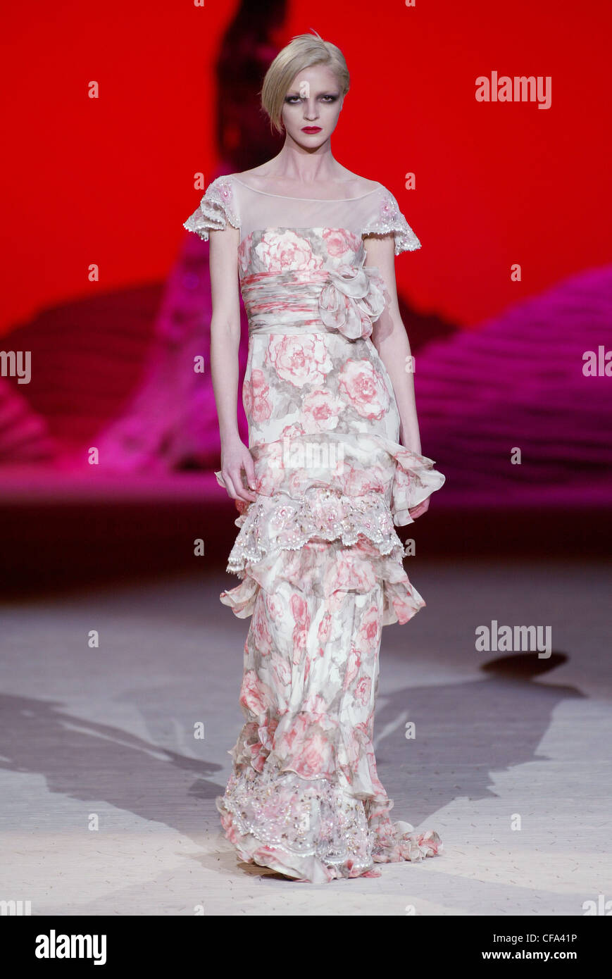 Haute Couture Valentino Spring Summer Paris Model Mariacarla Boscono  wearing a full length pale pink floral dress cap flutter Stock Photo - Alamy