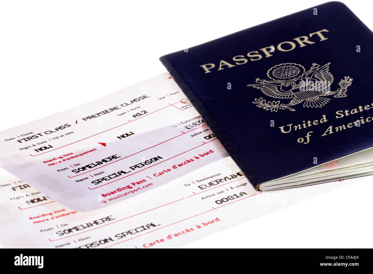 US passport with two special person boarding passes traveling first class Stock Photo
