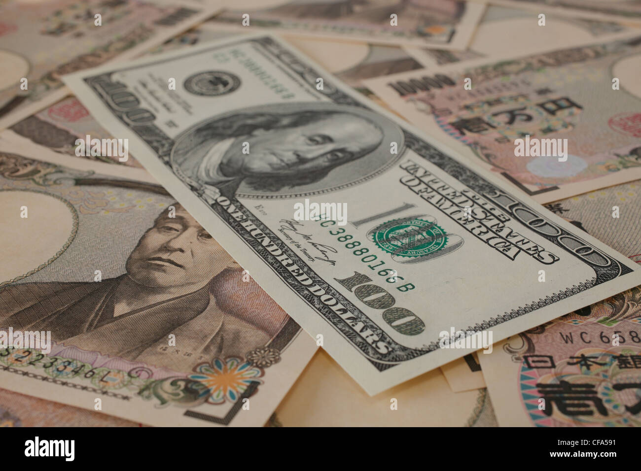Japanease 10000 yen and 100 Dollar Stock Photo - Alamy