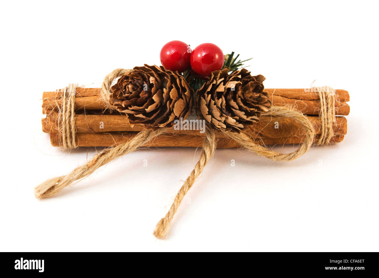 Festive cinnamon stick over white Stock Photo