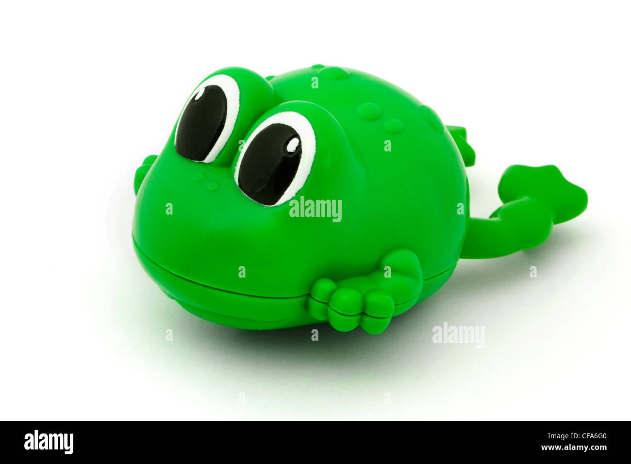 Green plastic bath toy frog over white Stock Photo - Alamy
