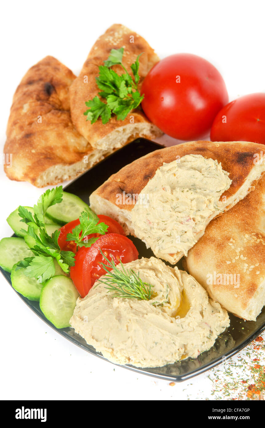 Bread with pate and fresh vegetables of tomatoes and cucumbers Stock Photo