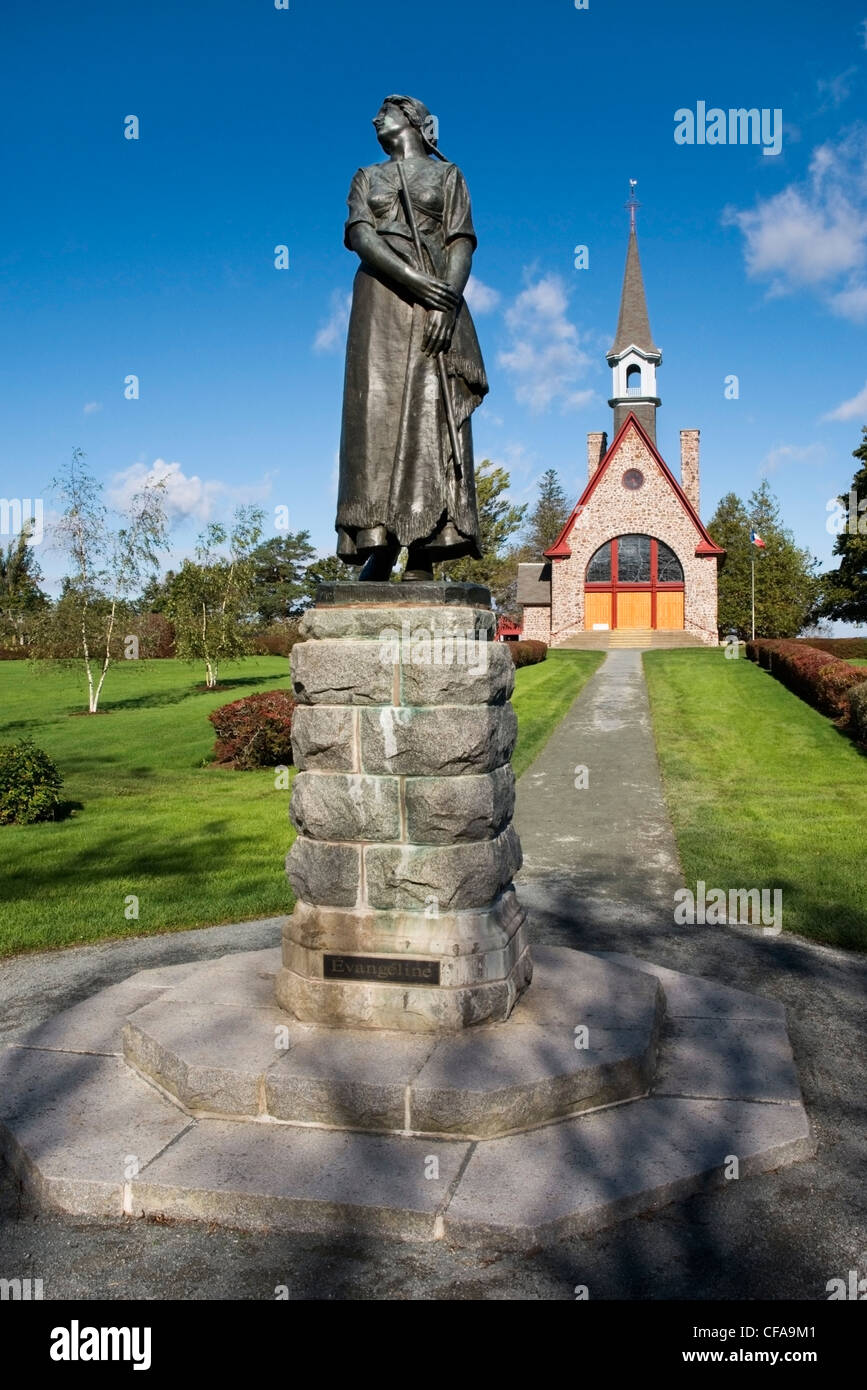 Acadian Church and Evangeline statue. Grand Pre National Historic Site, Nova Scotia, Canada. Stock Photo