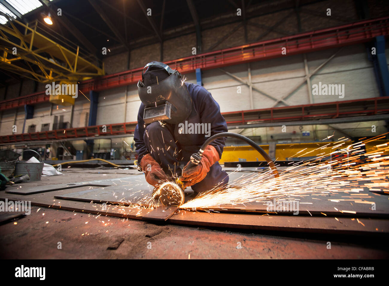 Steel cutter at work in shipyard Stock Photo Alamy