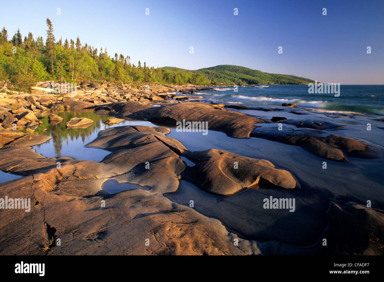 The rocky shoreline of Lake Superior at sunset, Neys Provincial Park