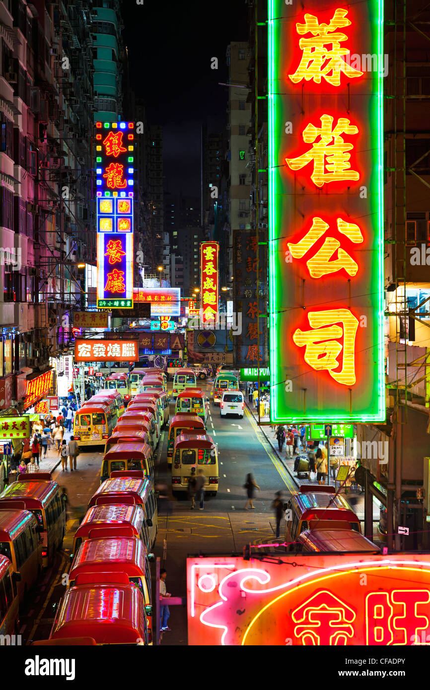 Street scene, Mini bus station and Neon lights of Mong Kok, Kowloon, Hong Kong, China Stock Photo