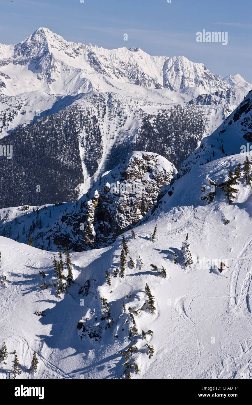 Young man telemarkskiing at Revelstoke Mountain Resort, BC, Canada
