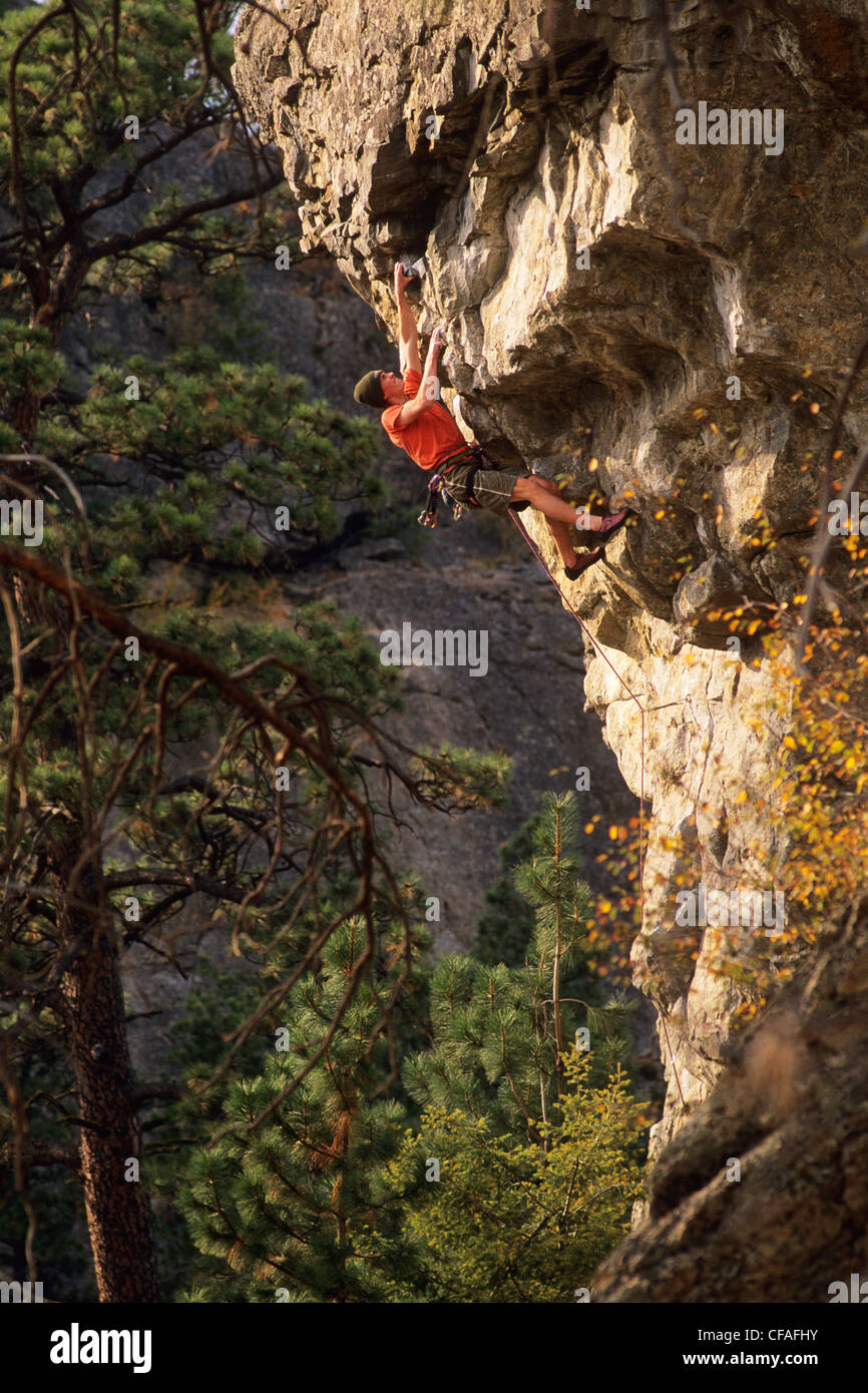 Man climbing on the Wave Wall, Skaha Bluffs. Penticton, British
