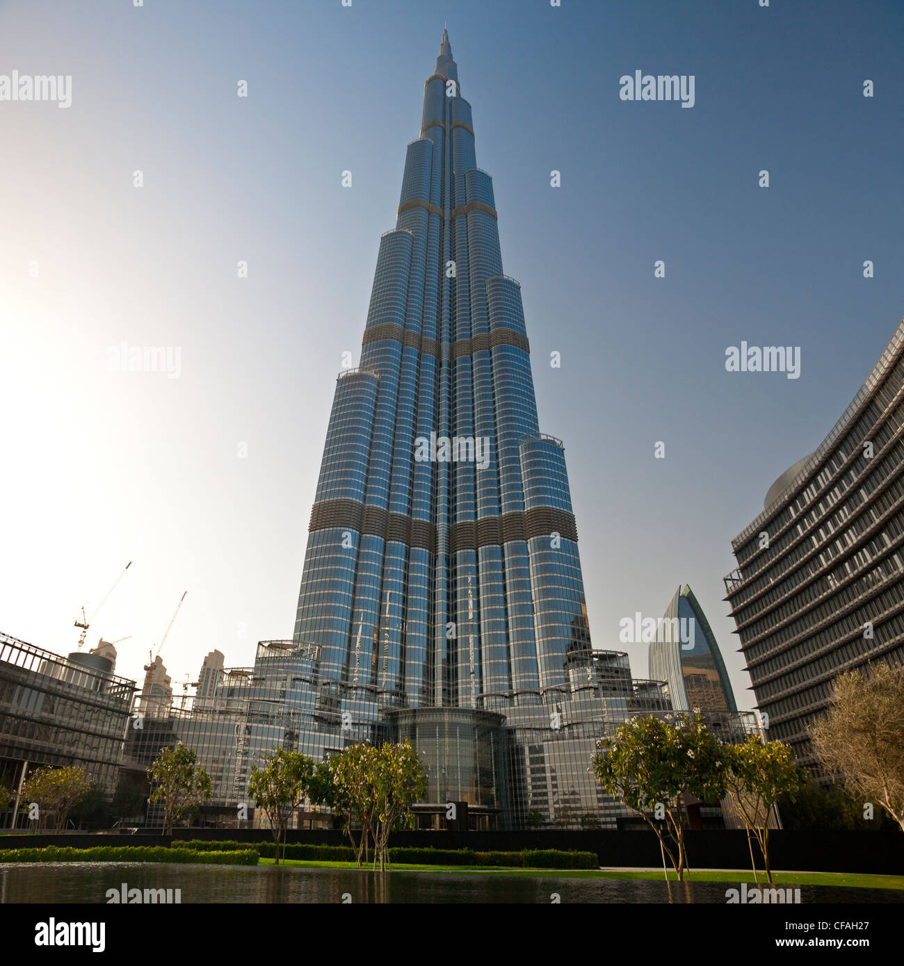 A low-angle shot of the Burj Khalifa tower seen from the vantage point of the Burj Khalifa Park (Dubai - United Arab Emirates). Stock Photo