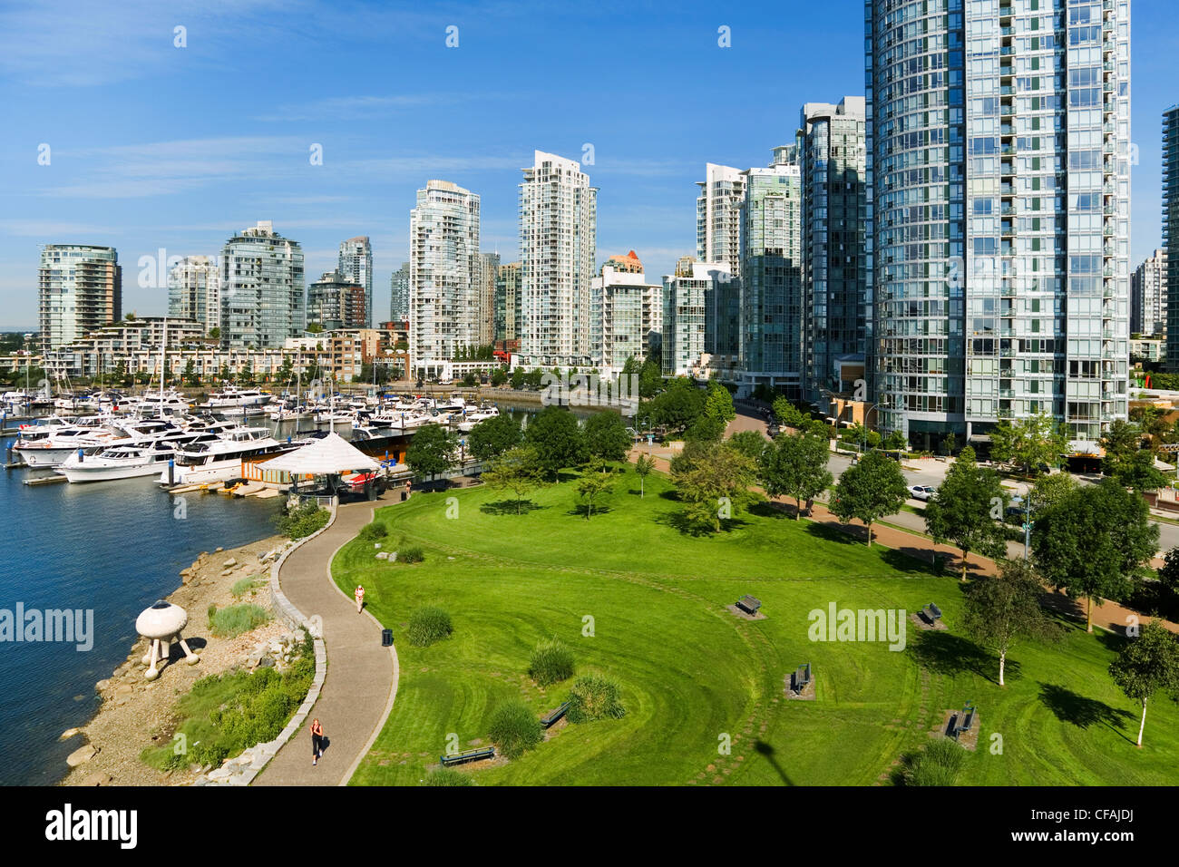 Downtown condominiums along Marinaside Crescent and Coopers Park from Cambie Bridge, Vancouver, British Columbia, Canada. Stock Photo