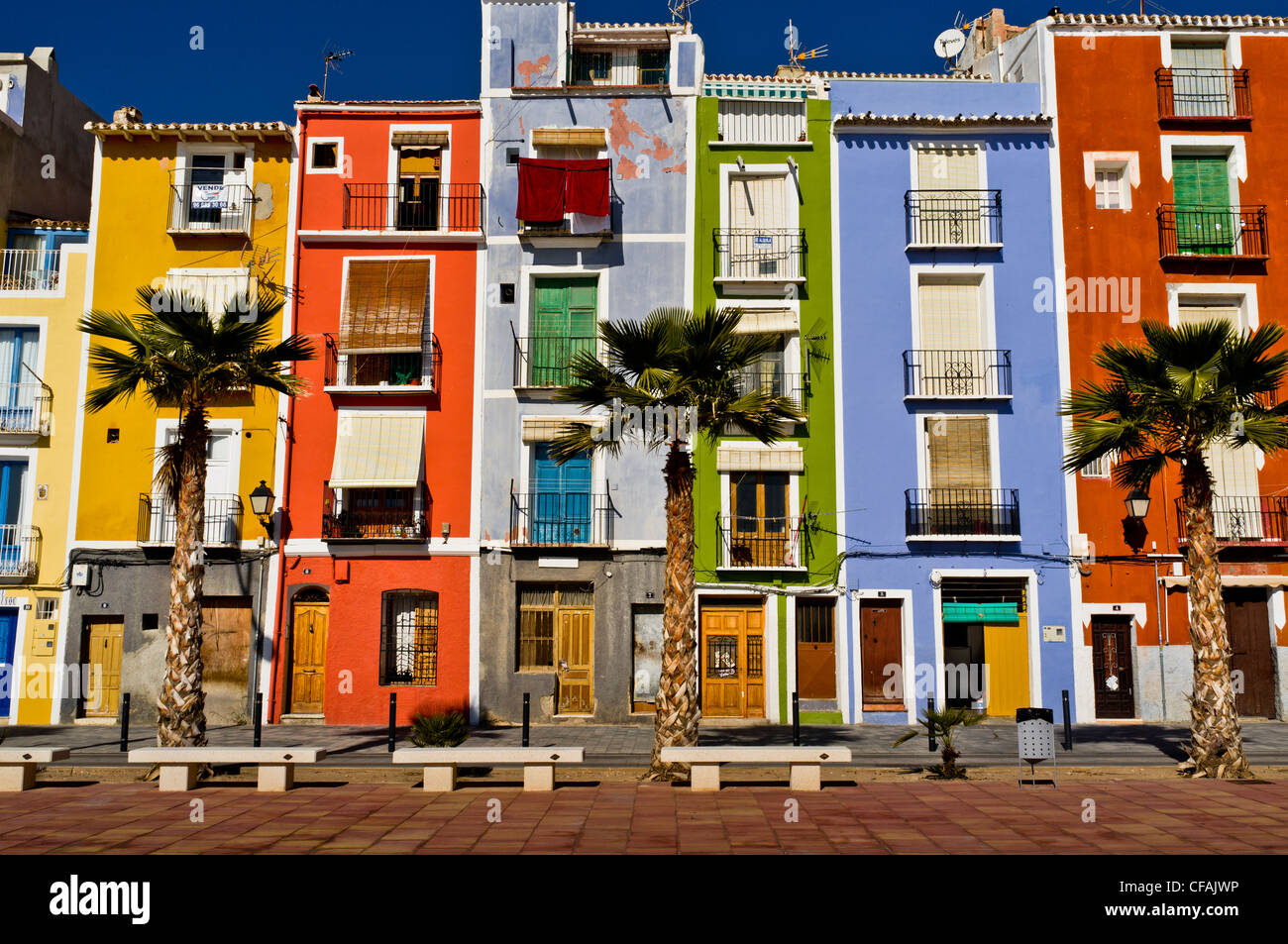 Multi-colored fishermens houses in a Spanish seaside town. Stock Photo