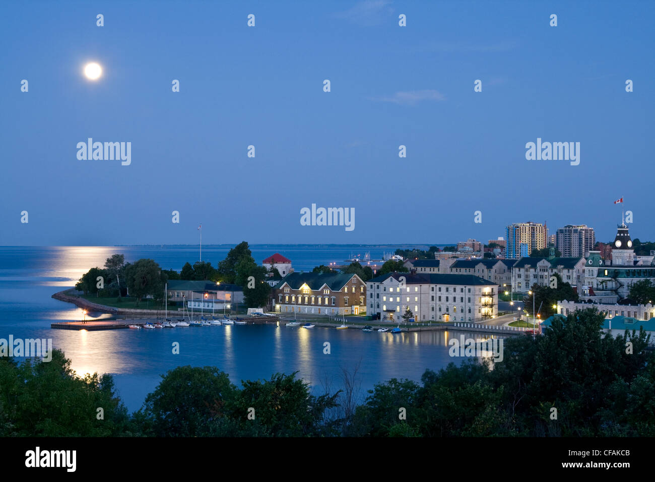 Moon over the Royal Military College and downtown Kingston, Ontario, Canada. Stock Photo