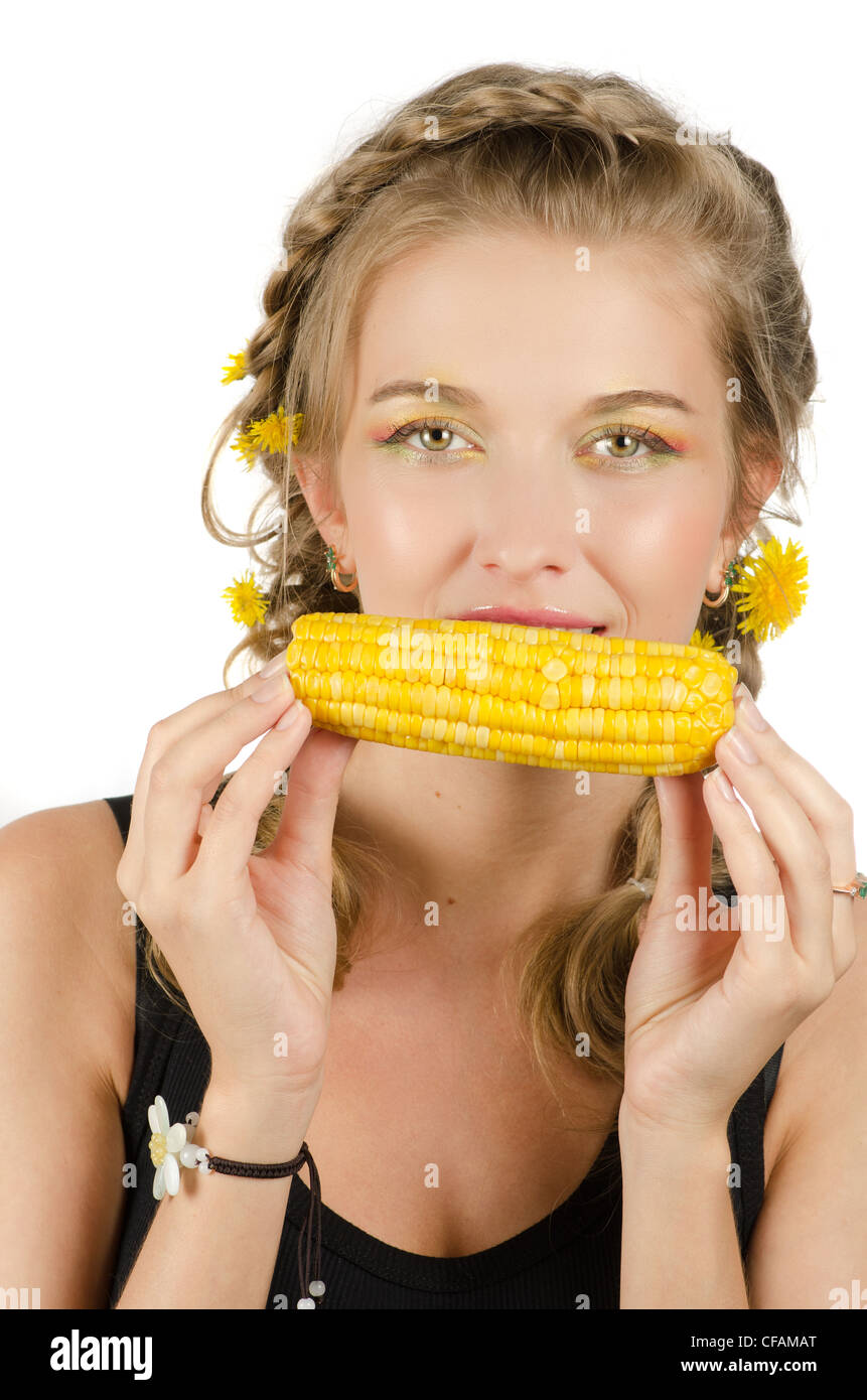 Closeup portrait of young beauty woman eating corncob on a white Stock Photo Alamy