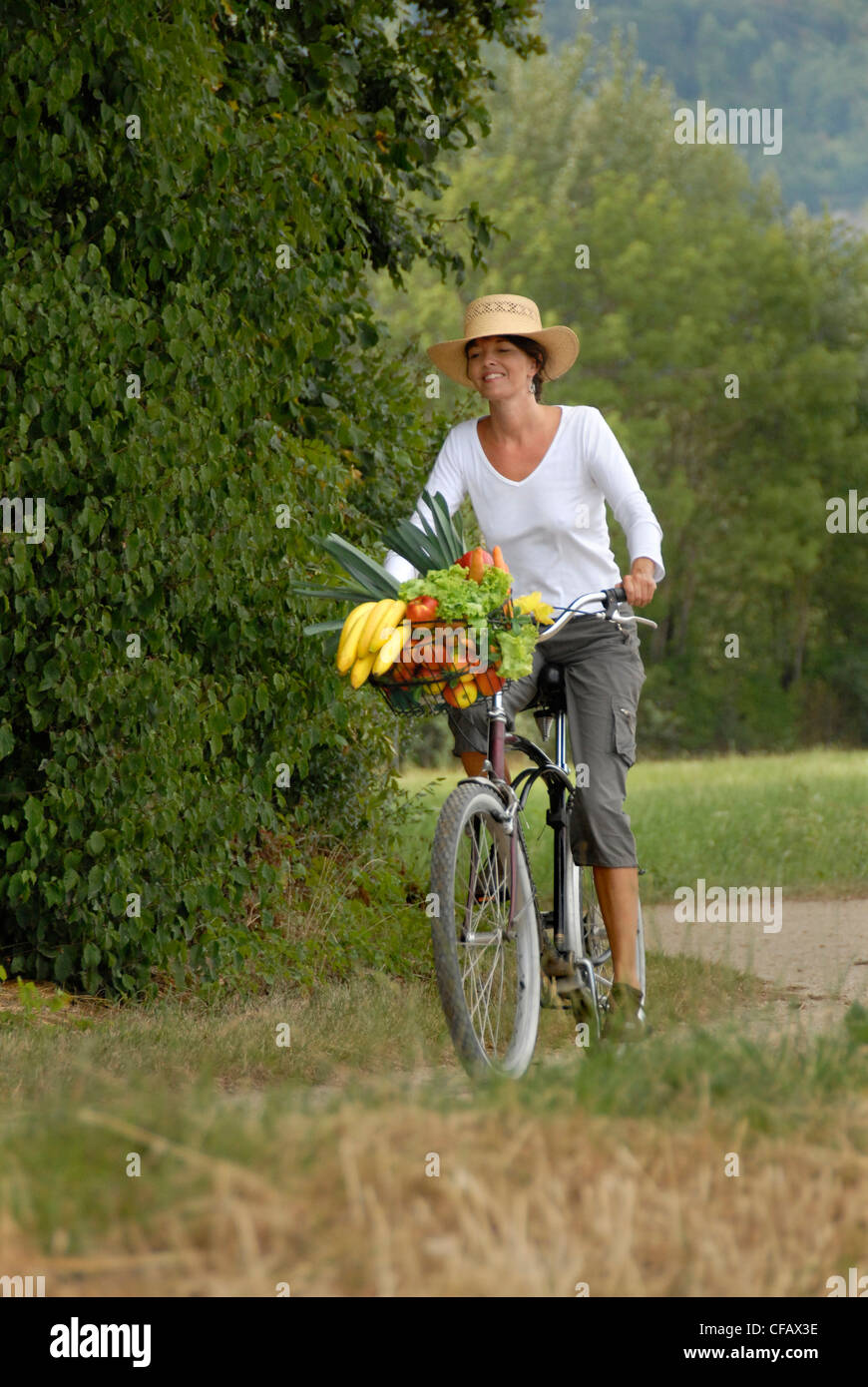 Summer, food, nutrition, land life, health, vegetables, fruits, purchase, vitamins, bicycle, bike, healthy, woman, Switzerland, Stock Photo