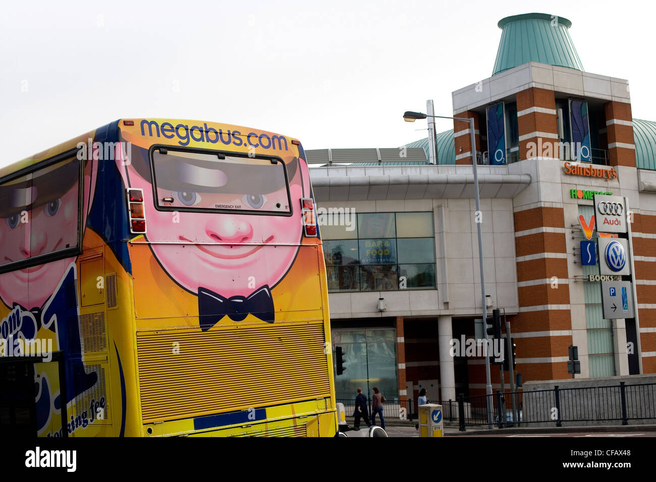 Megabus with cartoon face outside Sainsburys supermarket, Finchly Road, London, UK. Stock Photo