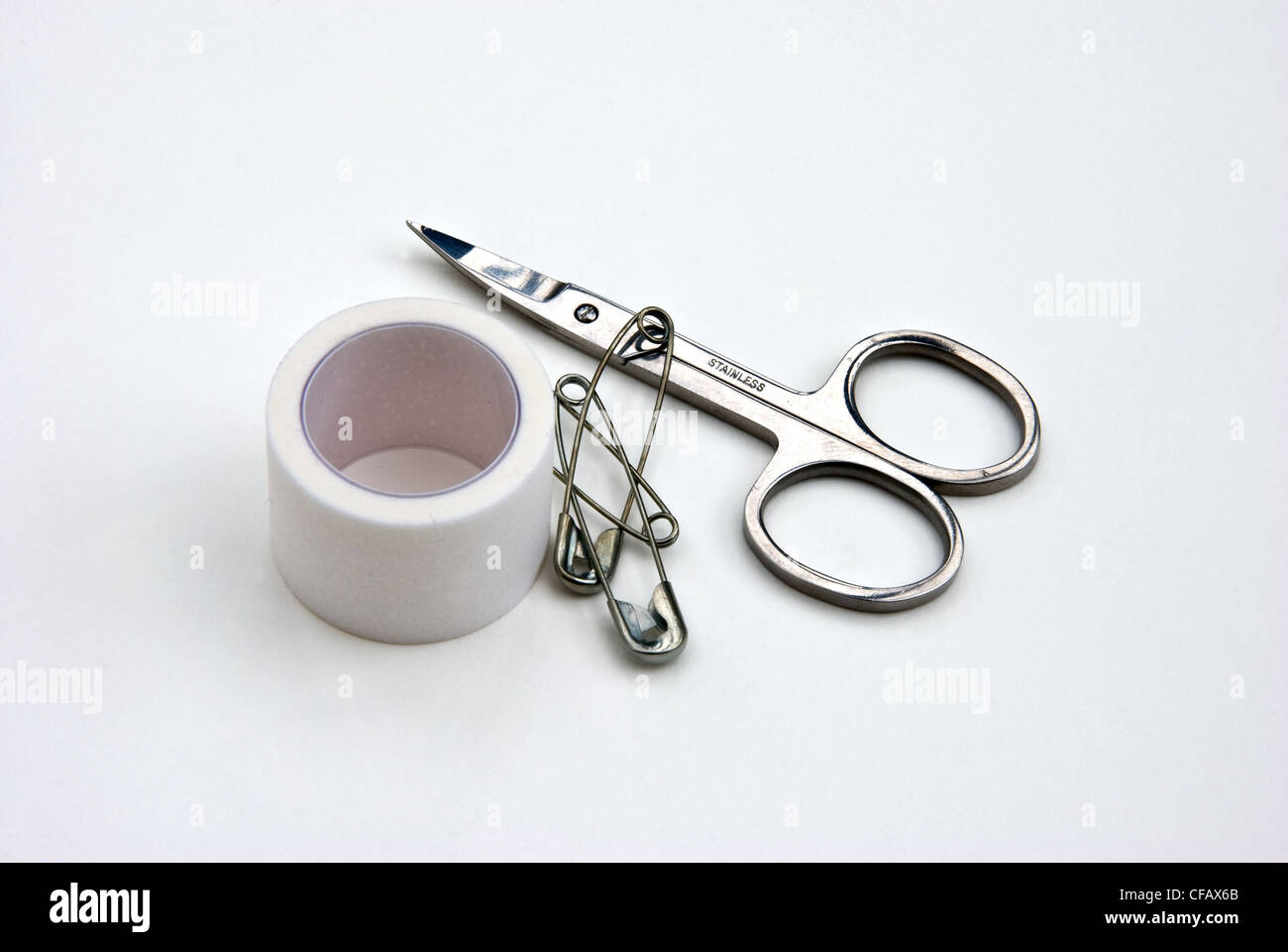 Medical tape, scissors and safety pin ready for first aid Stock Photo Alamy