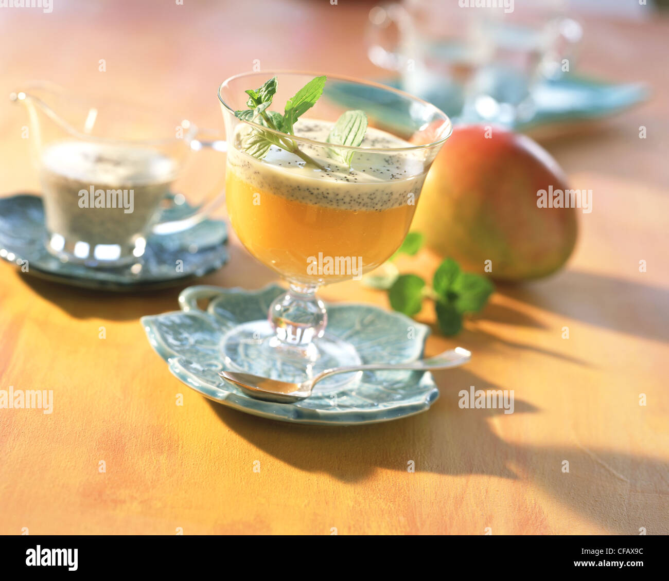 Mango jelly with poppy seed sauce Stock Photo Alamy