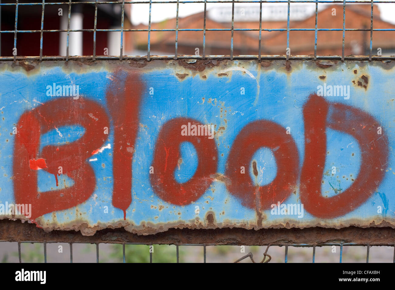 "Blood" graffitied onto gate near Birmingham city centre Stock Photo