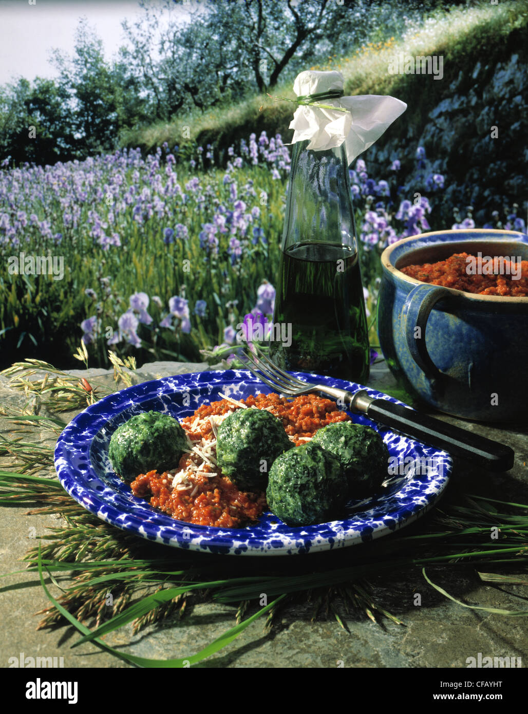 Spinach gnocchi on sauce bolognese Stock Photo - Alamy