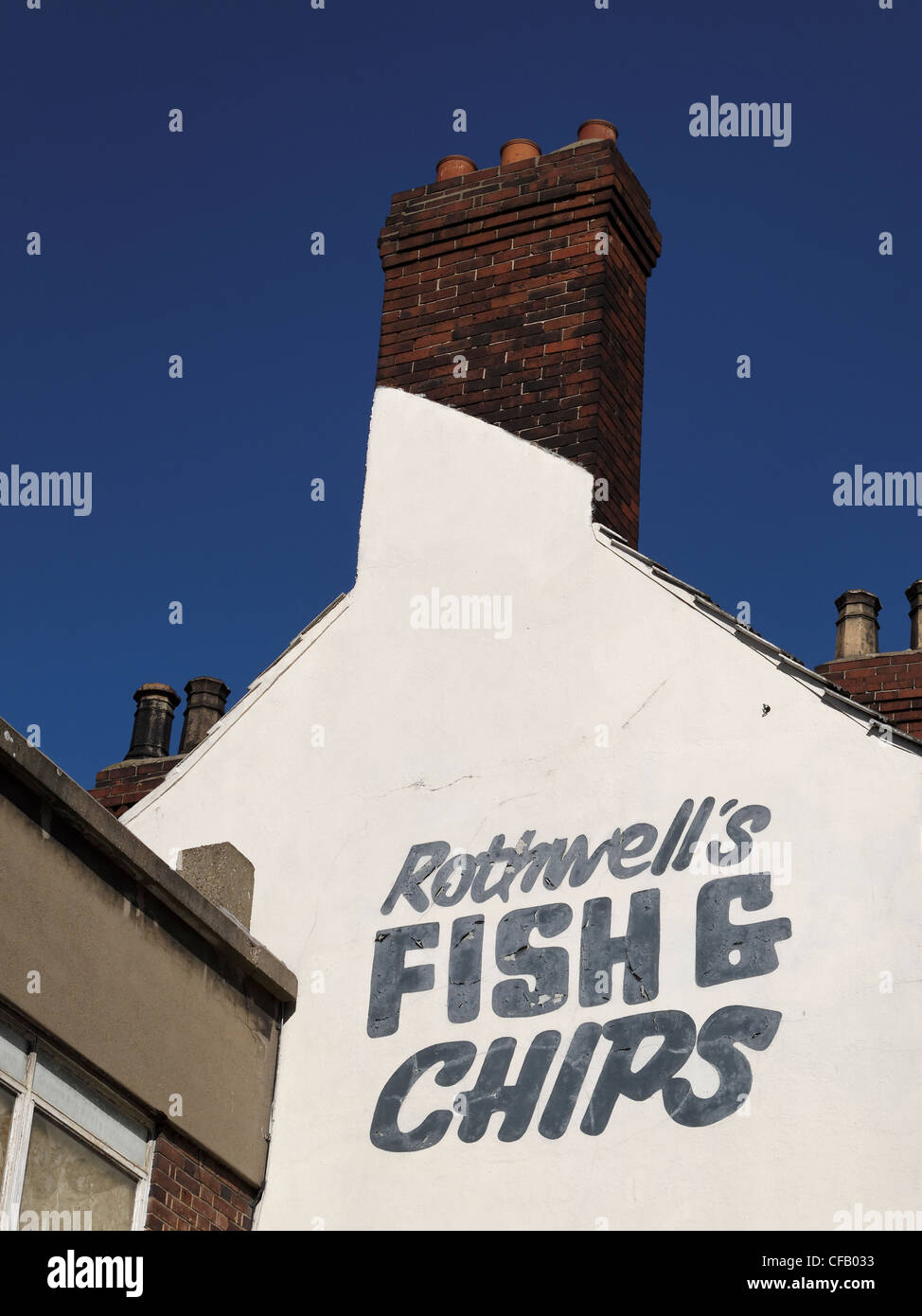 A sign advertising a Fish and Chip shop in the centre of Doncaster