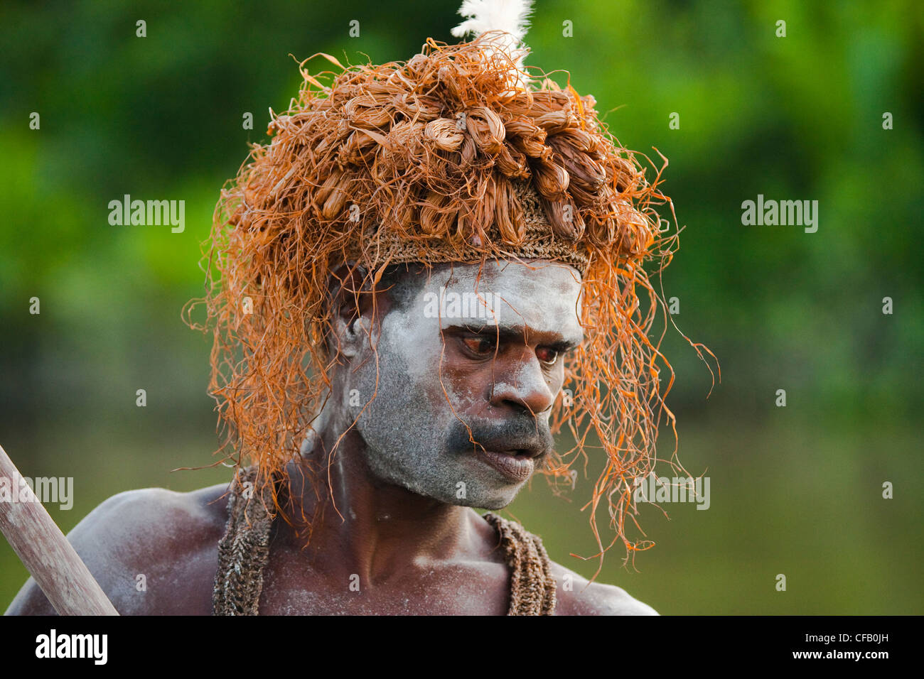 Man from the Asmat Tribe, Agats village, New Guinea, Indonesia Stock Photo