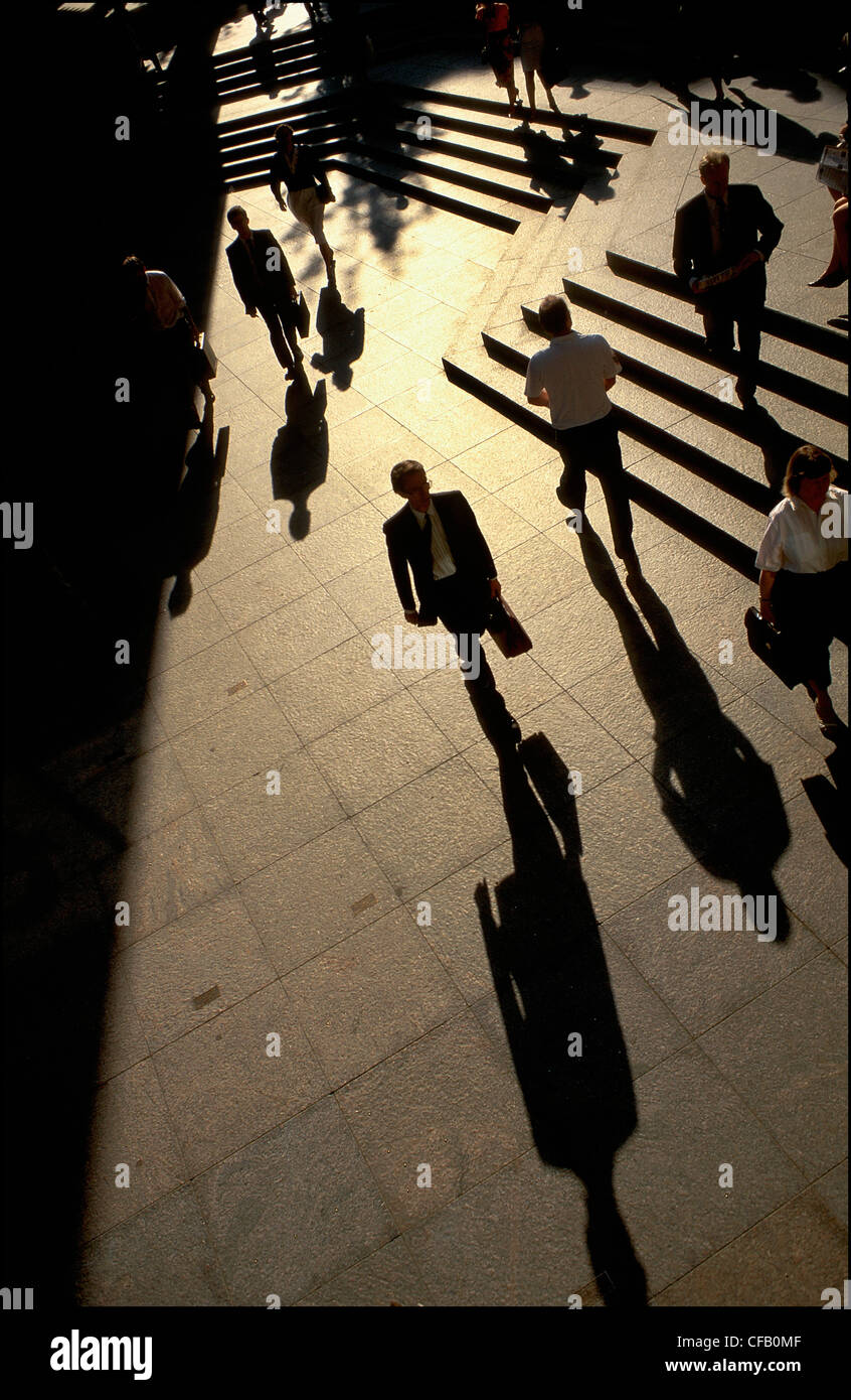 Pedestrians Walking In The Early Evening Across The Open Plaza At Stock Photo Alamy