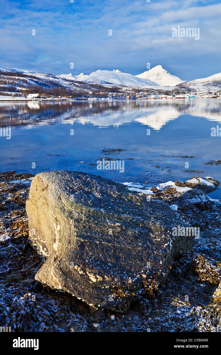 snow covered mountains on the Island of Kvaloy and Eidkjosen village Norway Europe Stock Photo