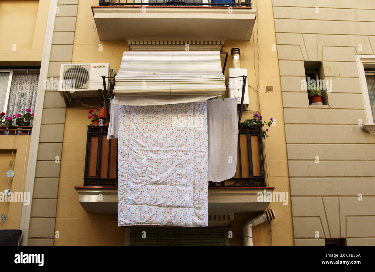 Balcony with washing, in Barceloneta, the fisherman's quarter of Barcelona, Spain Stock Photo