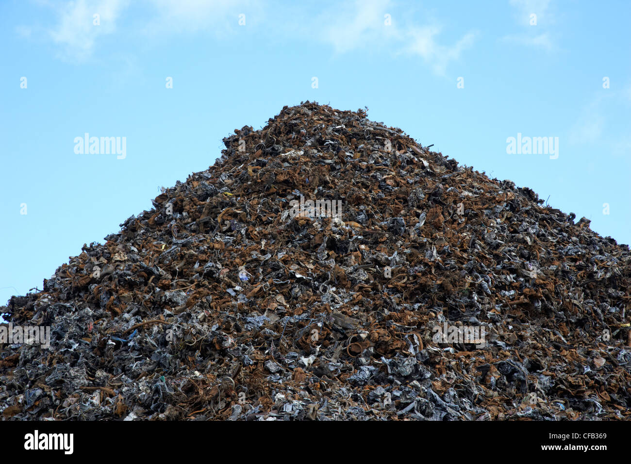 pile of recycled and shredded metals at metal recycling site Belfast Northern Ireland UK Stock