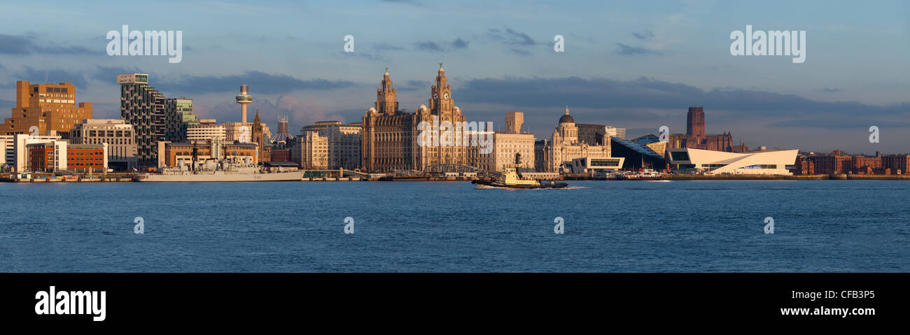 Panoramic photograph of Liverpool's Skyline with HMS Liverpool on it's final Journey. Stock Photo