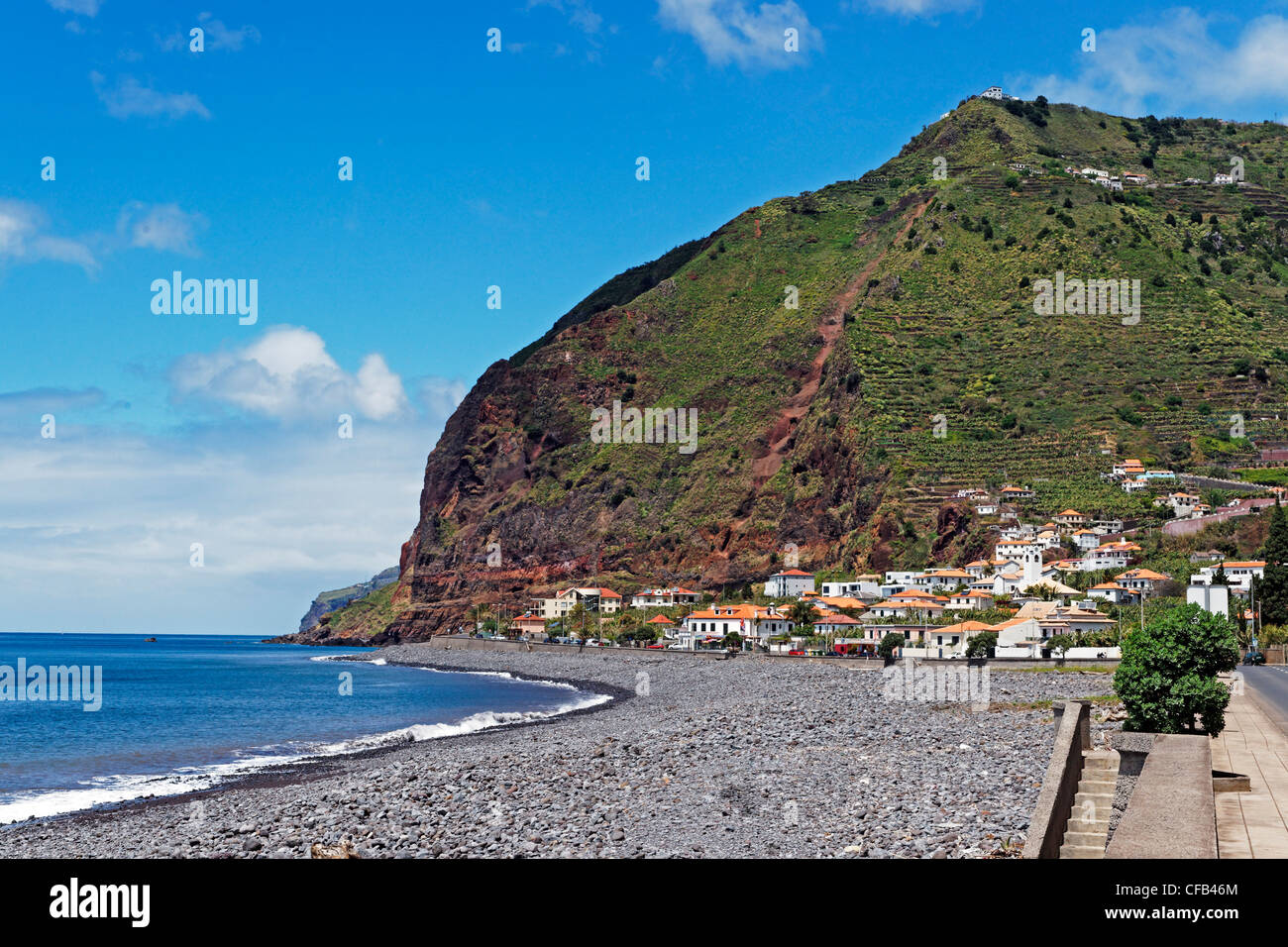 Europe, Portugal, Republica Portuguesa, Madeira, Madalena do Mar, Avenida 1o de Fevereiro, local view, gravel beach, roughly, bu Stock Photo