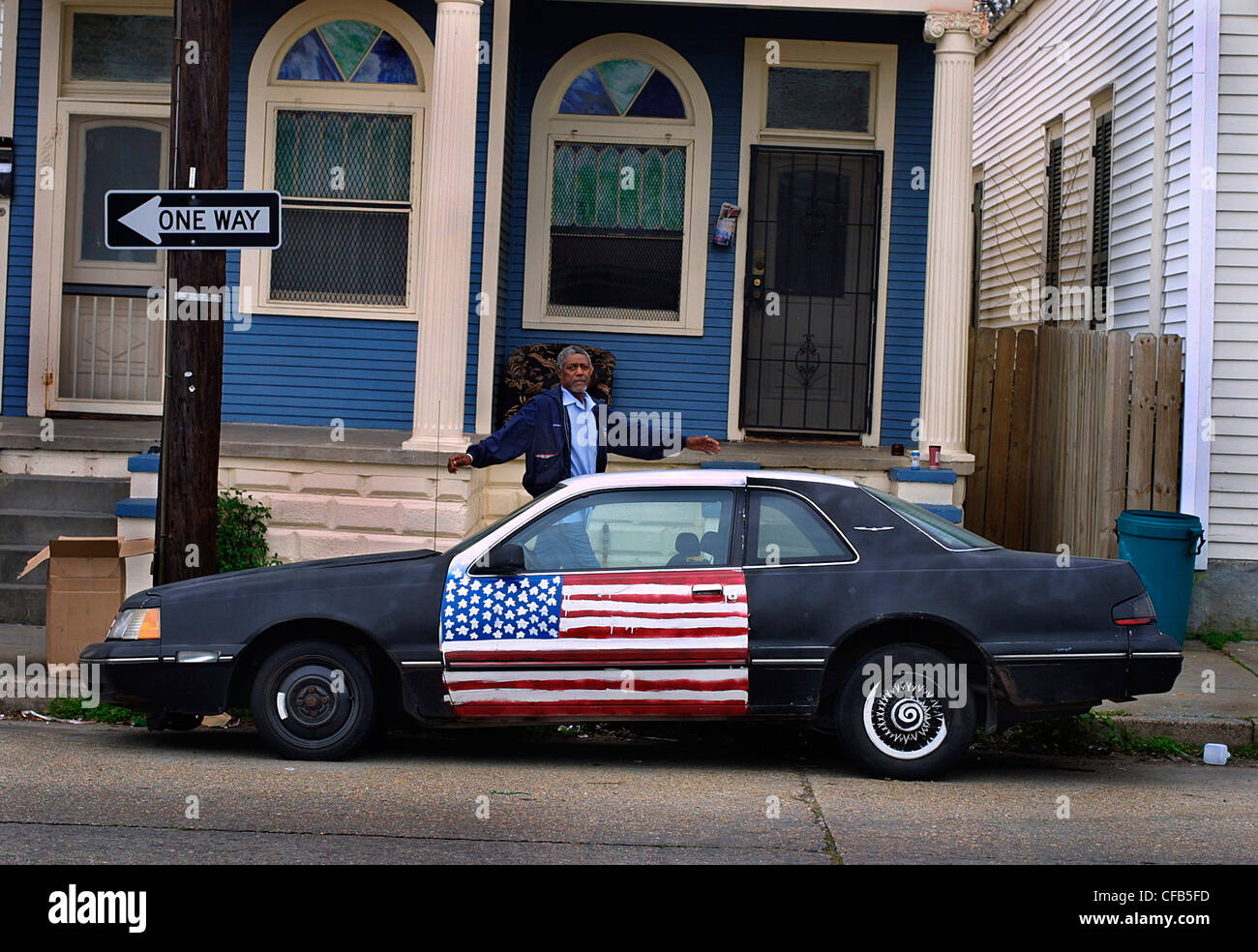 Car with American flag painted on the driver's door, New Orleans Stock Photo