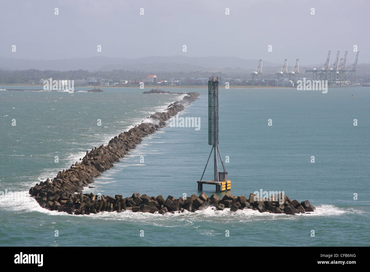 The breakwaters at Colon, Panama, with the Colon Container Terminal in the background Stock Photo