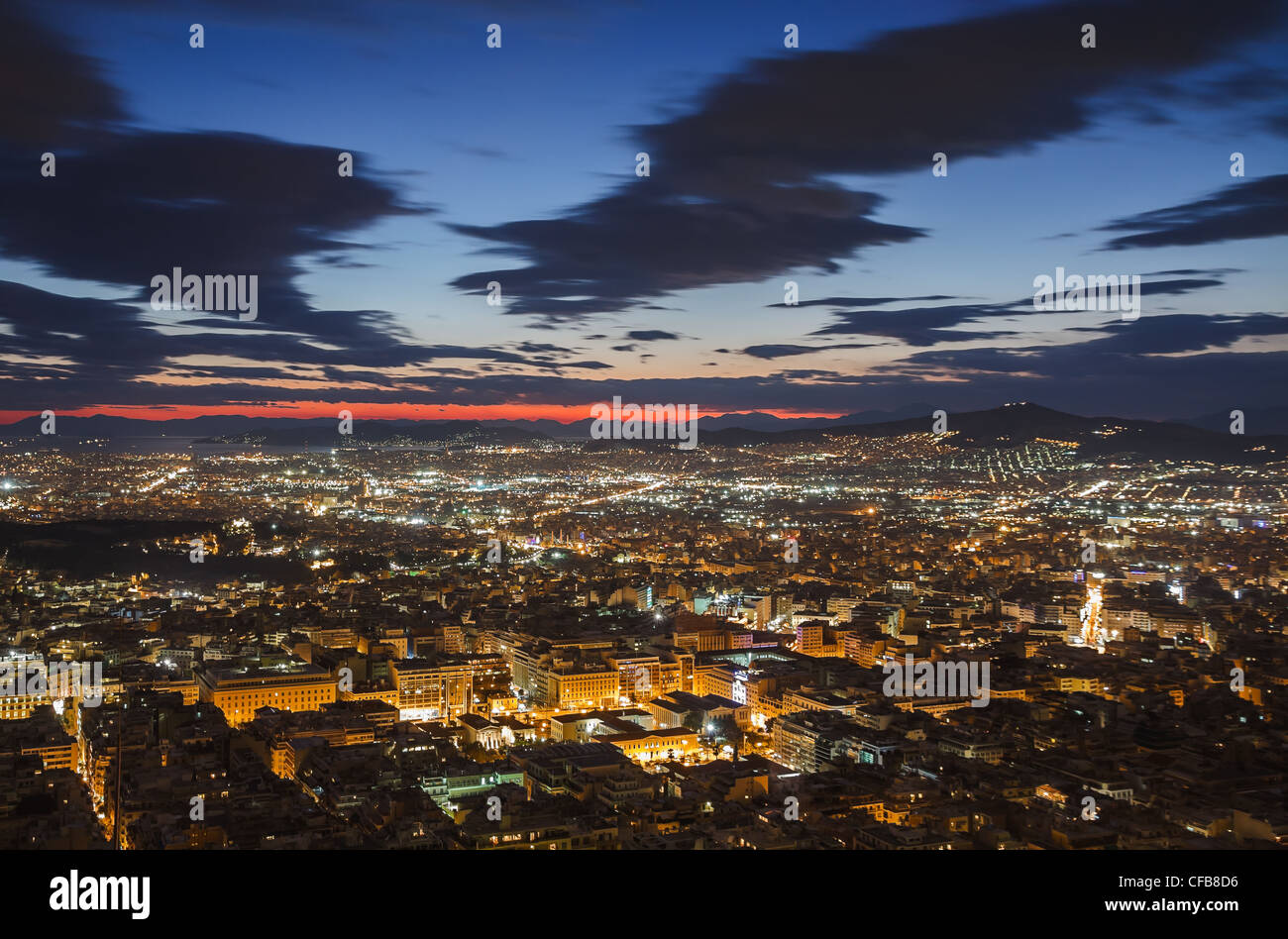 Athens skyline aerial view in the afternoon with the lights over blue hour Stock Photo