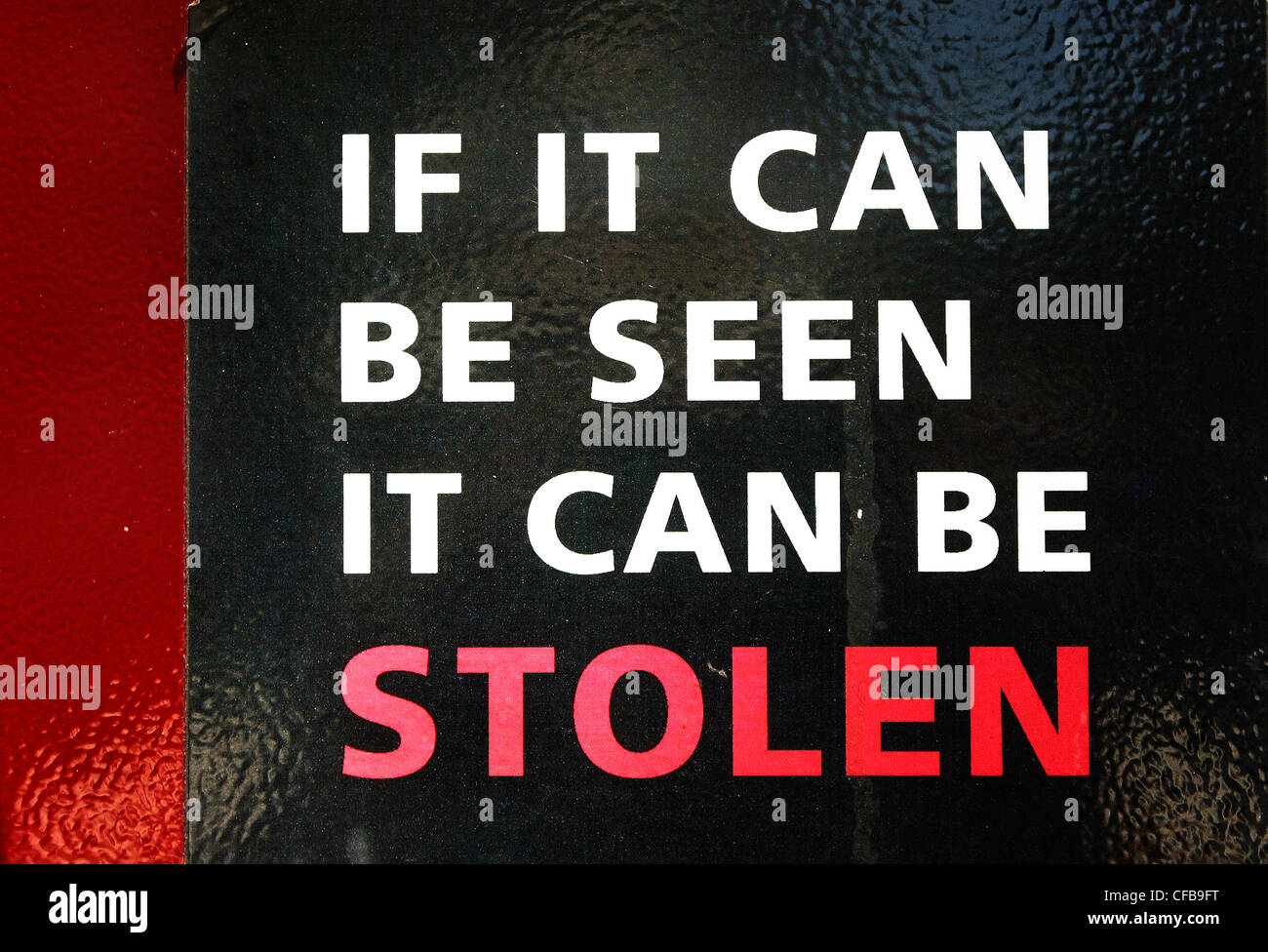 Warning on parking meter about theft, Sydney, Australia. Stock Photo