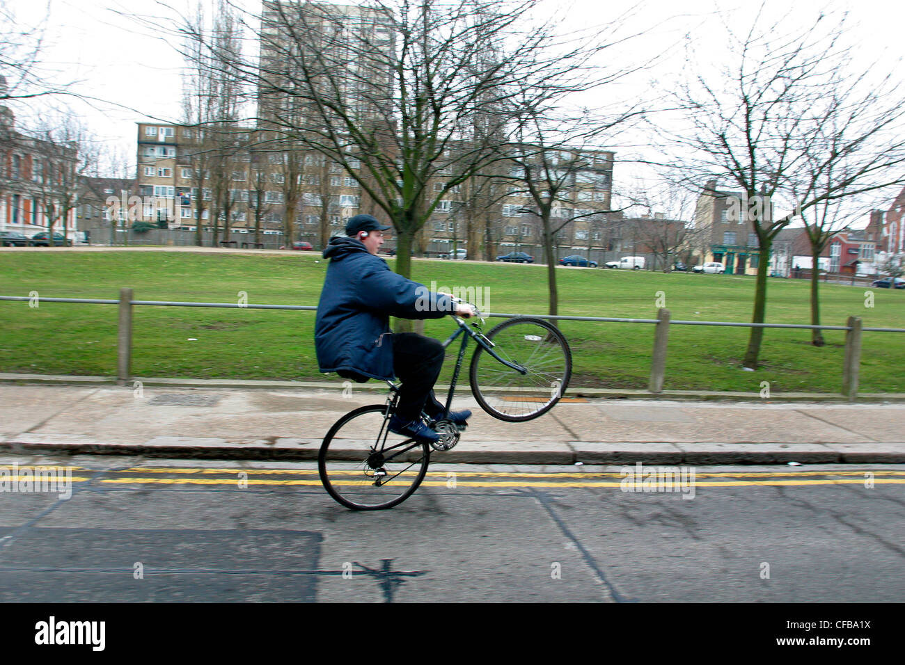 Boy doing wheely on bicycle, Hackney, London, UK Stock Photo Alamy